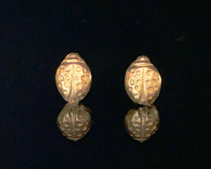 Gold ladybug stud earrings. Can be made in 14K and 18K gold. By Juju By Sarah.