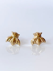 Solid 14K gold stud earrings in the shape of a bee. Created using a vintage jewelry die.