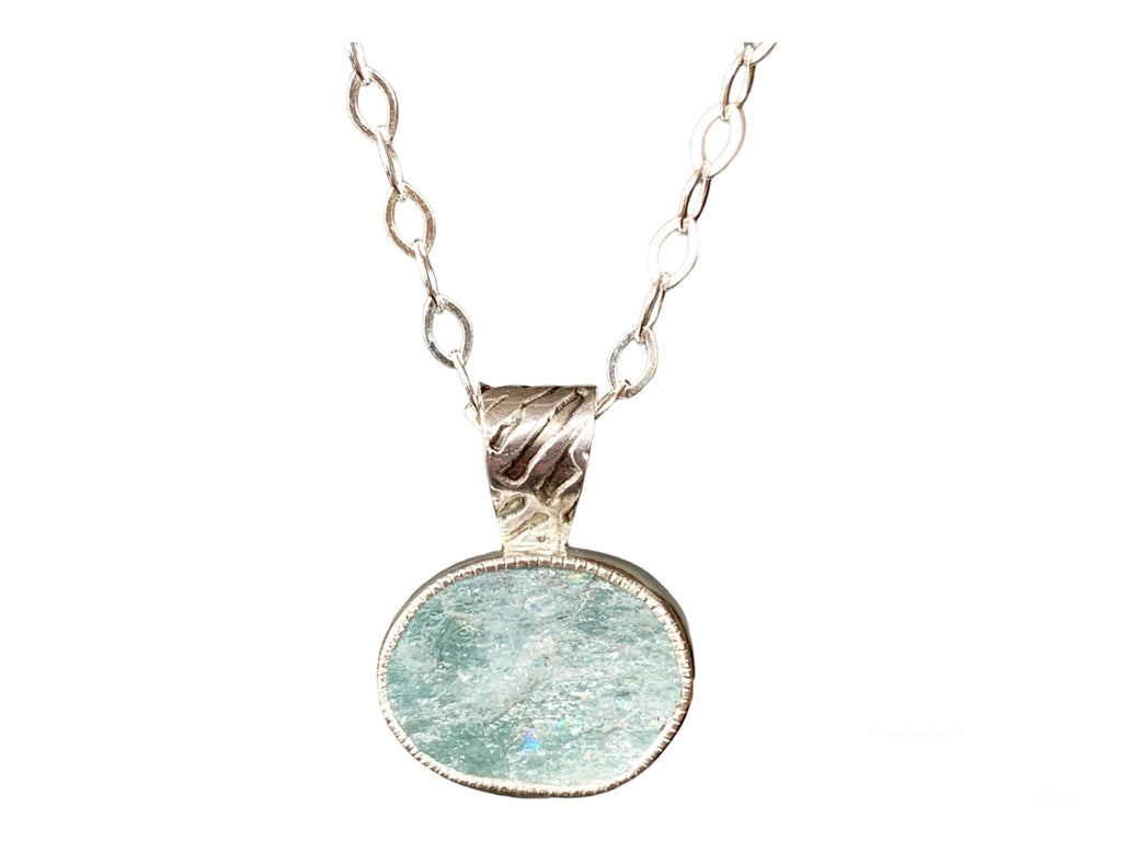 Natural top Aquamarine gemstone pendant. Raw stone.
