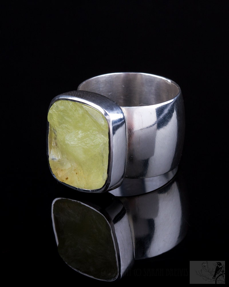 Natural rough top yellow green Prehnite gemstone ring in sterling silver. Extra wide comfort fit band in size 8.5.
