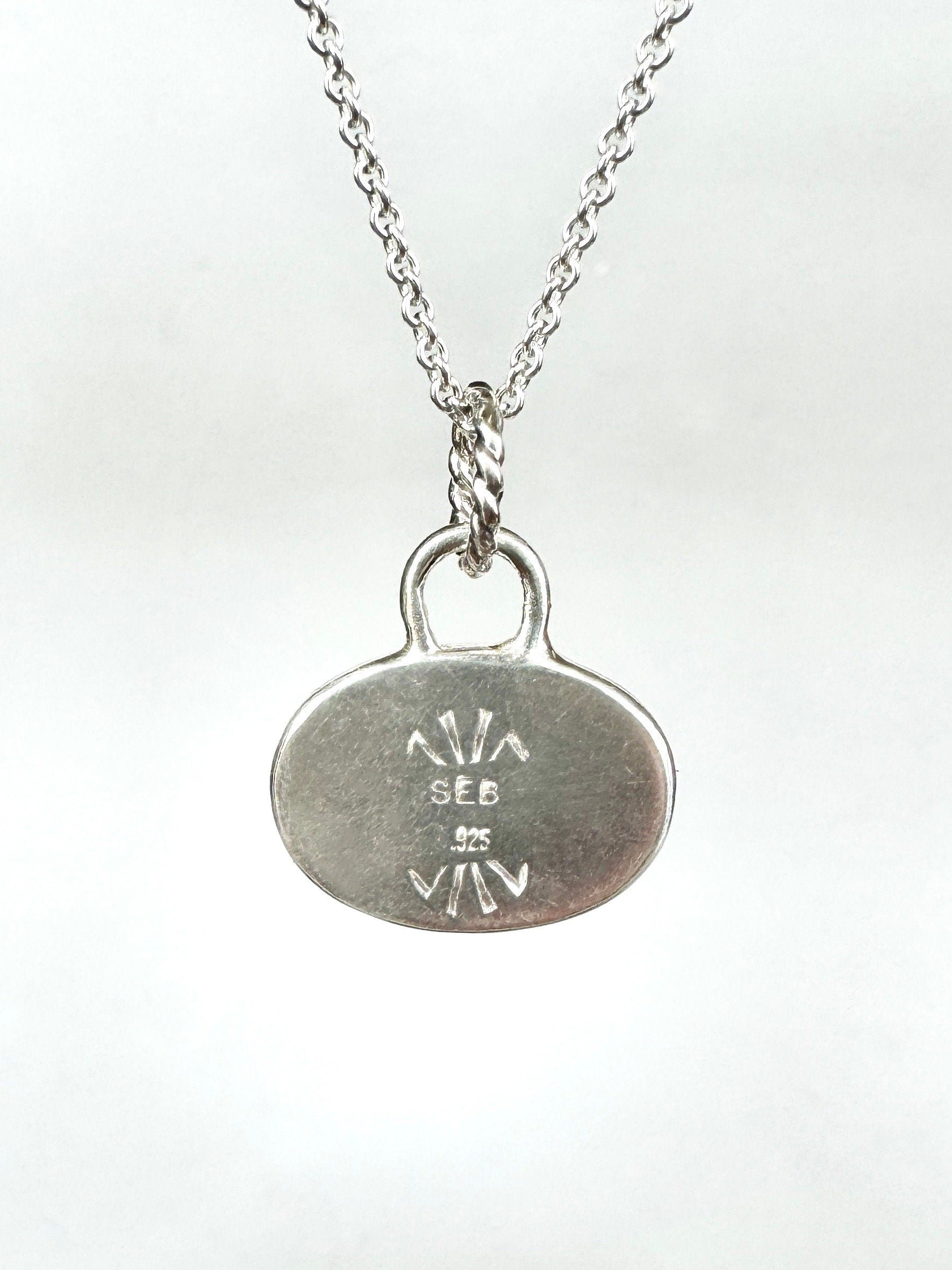 Roaring Lion Pendant with Blue Sapphire, sterling silver