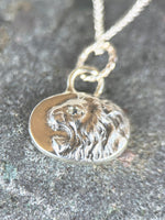 Load image into Gallery viewer, Roaring Lion Pendant with Blue Sapphire, sterling silver
