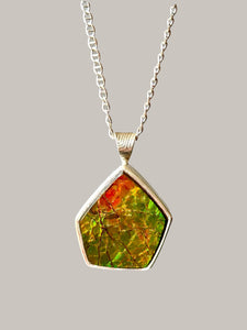 Geometric Ammonite pendant in Sterling Silver, iridescent green