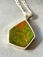 Load image into Gallery viewer, Geometric Ammonite pendant in Sterling Silver, iridescent green
