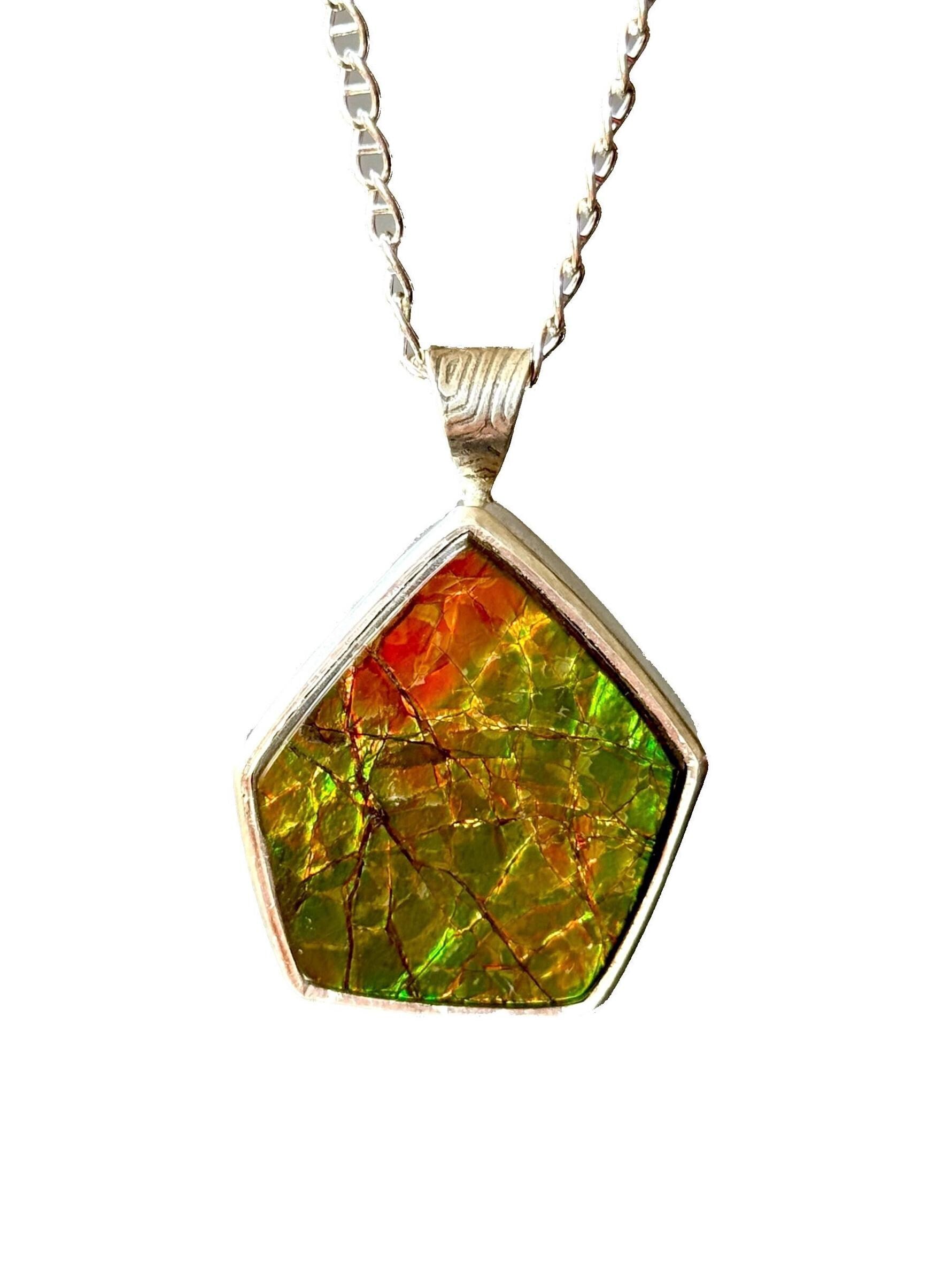 Geometric Ammonite pendant in Sterling Silver, iridescent green