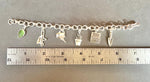 Load image into Gallery viewer, Gardening Charm Bracelet, handmade chain in sterling silver
