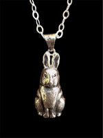 Load image into Gallery viewer, Rabbit pendant in sterling silver created using a vintage jewelry die.
