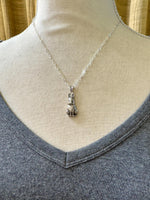 Load image into Gallery viewer, Rabbit Pendant in Sterling Silver, vintage die pressed
