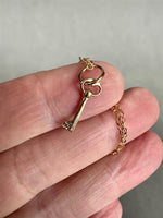 Load image into Gallery viewer, 14K Gold Antique Key Charm: Solid Yellow Gold, Fairy Door
