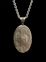 Load image into Gallery viewer, Egyptian Revival Scarab Beetle pendant in sterling silver, vintage die , art deco, hieroglyphics
