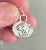 Load and play video in Gallery viewer, Roaring Lion Pendant with Blue Sapphire, sterling silver
