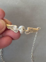 Load and play video in Gallery viewer, Pearl Winged Skull Pendant in Sterling Silver
