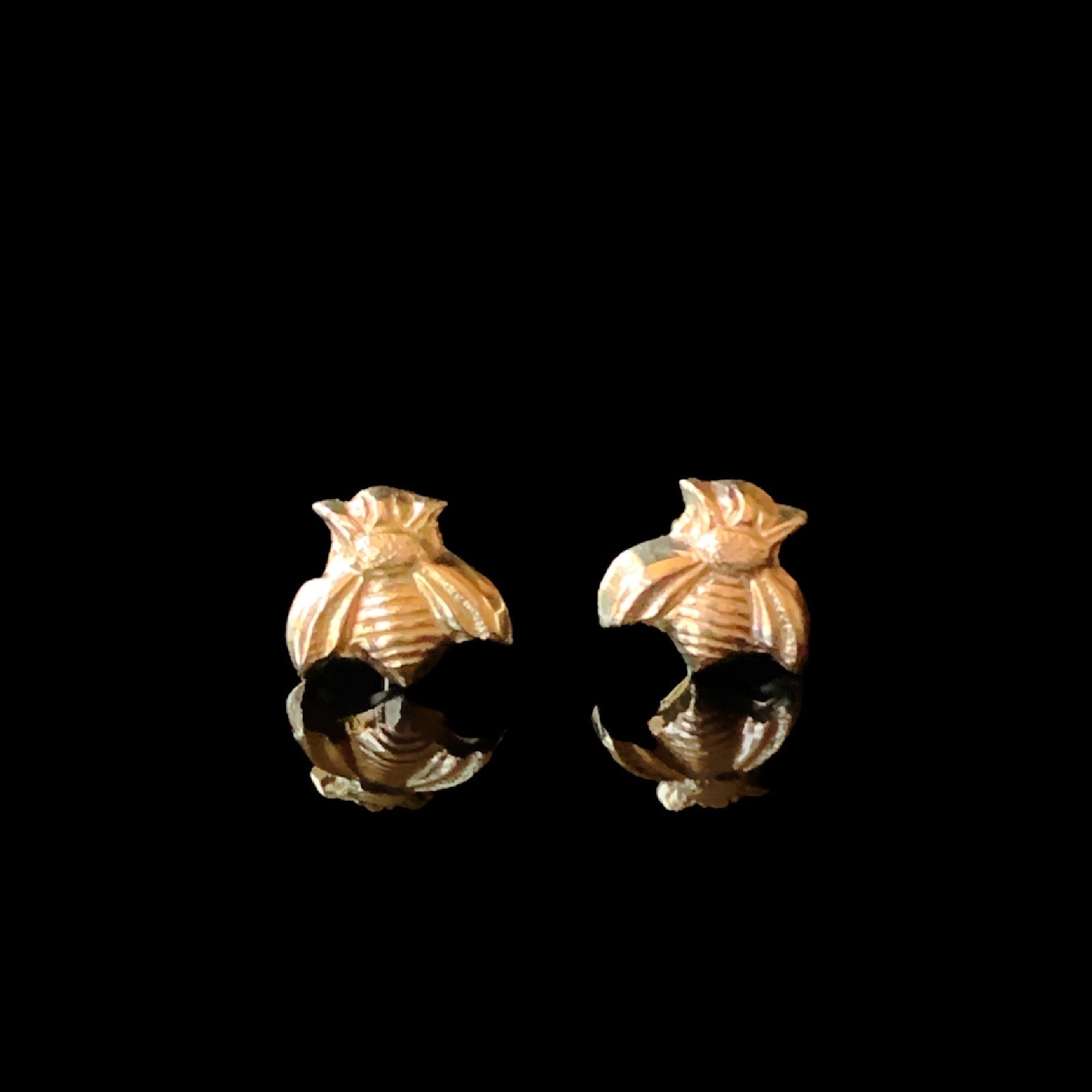 Solid 14K gold honey bee stud earrings.