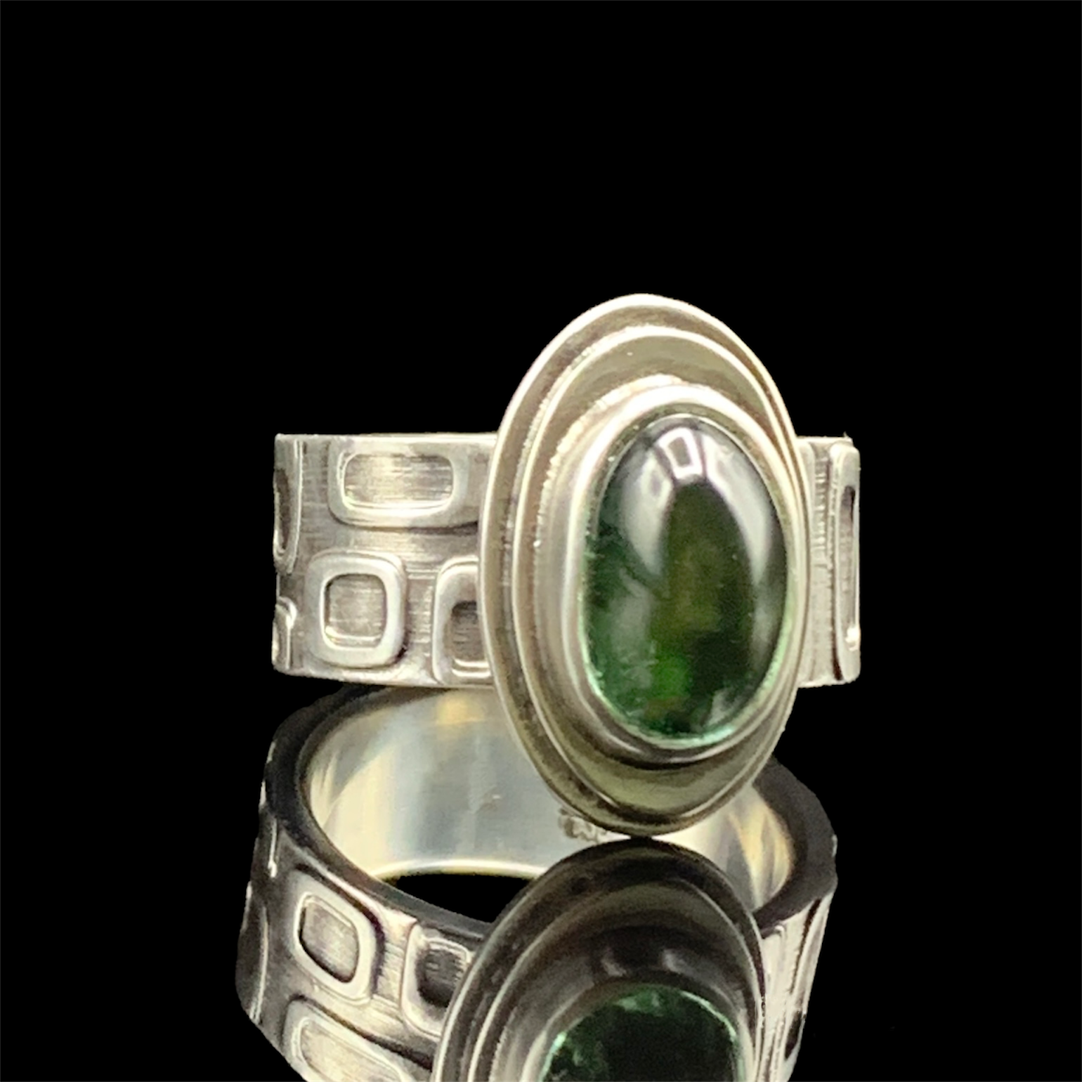 Dark green tourmaline ring with square pattern on shank