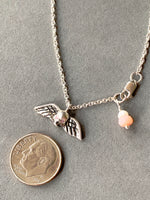 Load image into Gallery viewer, Tiny Winged Skull with Pink Diamonds

