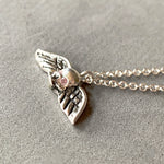 Load image into Gallery viewer, Tiny Winged Skull with Pink Diamonds
