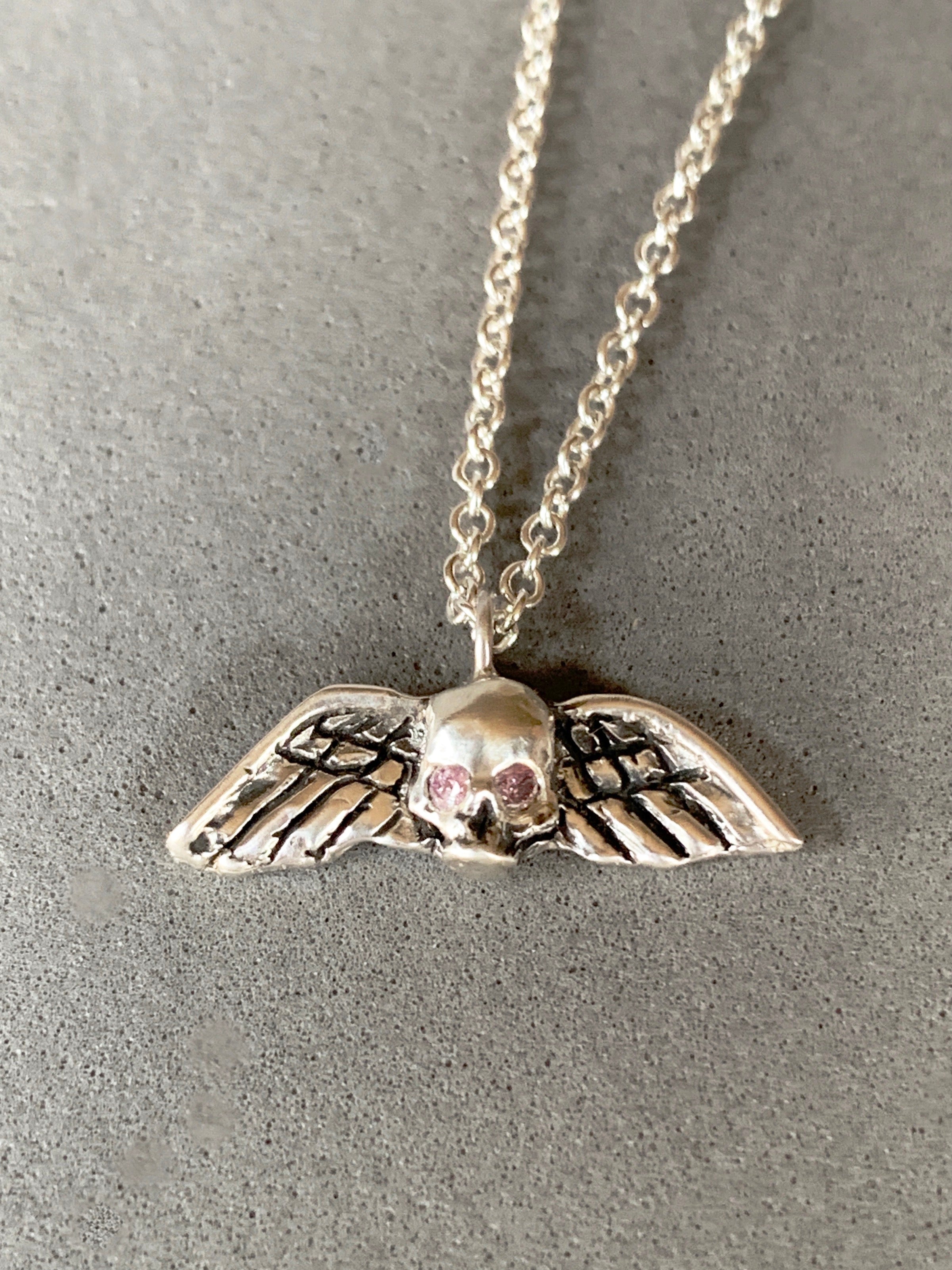Tiny Winged Skull with Pink Diamonds