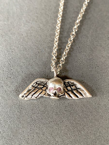Tiny Winged Skull with Pink Diamonds