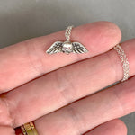 Load image into Gallery viewer, Tiny Winged Skull with Pink Diamonds
