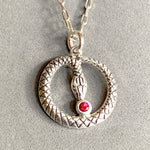 Load image into Gallery viewer, Snake Pendant with lab Ruby
