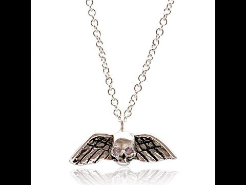 Tiny Winged Skull with Pink Diamonds