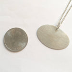 Load image into Gallery viewer, Double Arrow Stamped Pendant
