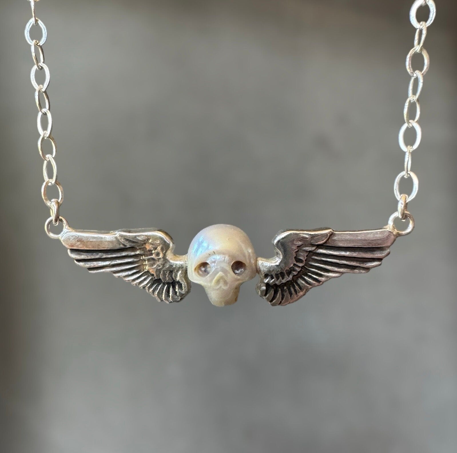 Pearl Winged Skull Pendant in Sterling Silver