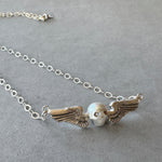 Load image into Gallery viewer, Pearl Winged Skull Pendant in Sterling Silver
